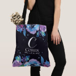 Blue Black and Purple Floral Wedding Monogram Tote Bag<br><div class="desc">There is something super chic about the dark, moody vibe of this design. It stands out, yet is still subtle. The background is a very dark, deep blue-black, like the midnight sky. Fully customisable, from colours to fonts. Please don't hesitate to contact us if you would like a change that...</div>