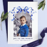 Blue Bow Joy to the World Christmas Photo Holiday Card<br><div class="desc">Celebrate the joy of the holiday season with this Blue Bow Joy to the World Christmas Photo Card. Featuring an elegant watercolor blue bow framing your cherished family photo, this design conveys a timeless message of peace and love. The sophisticated typography and soft blue accents make it the perfect card...</div>