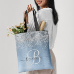 Blue Brushed Metal Silver Glitter Monogram Name Tote Bag<br><div class="desc">Easily personalise this trendy chic tote bag design featuring pretty silver sparkling glitter on a blue brushed metallic background.</div>