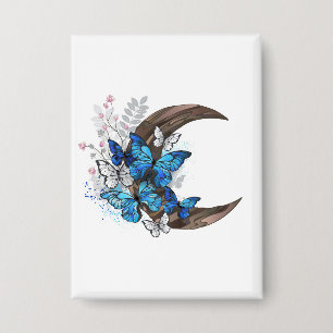 Blue butterflies on wooden crescent