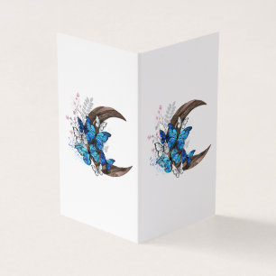 Blue butterflies on wooden crescent business card