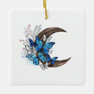 Blue butterflies on wooden crescent ceramic ornament