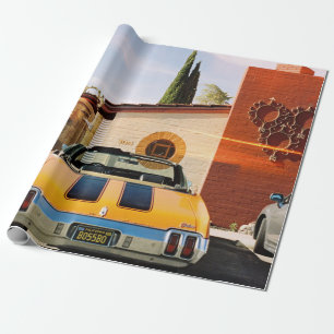 Blue car parked beside brown concrete building in wrapping paper