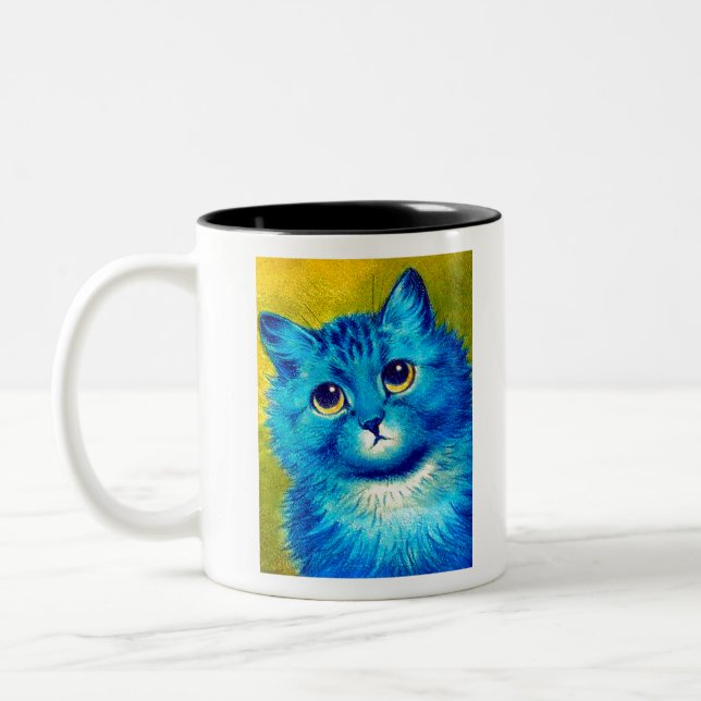 Blue cat by Louis Wain Two-Tone Coffee Mug (Left)