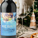 Blue Christmas Baubles Twinkling String Lights  Wine Label<br><div class="desc">Our personalised wine label will add a touch of elegance and seasonal cheer to your Christmas festivity. This label features a captivating blue background adorned with gold and green Christmas ornaments. The twinkling lights add a festive sparkle, illuminating the heartfelt message, "Merry Christmas". This label is not just a sticker...</div>