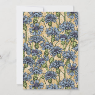 Blue cornflowers, wild flowers on honney yellow