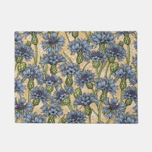 Blue cornflowers, wild flowers on honney yellow doormat
