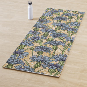 Blue cornflowers, wild flowers on honney yellow yoga mat