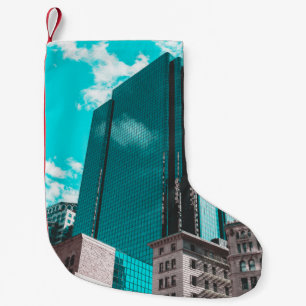 BLUE CURTAIN WALL BUILDING UNDER TEAL SKIES SMALL CHRISTMAS STOCKING