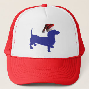 Blue Dachshund wearing a Santa Claus Hat