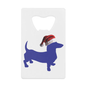 Blue Dachshund wearing a Santa Claus Hat