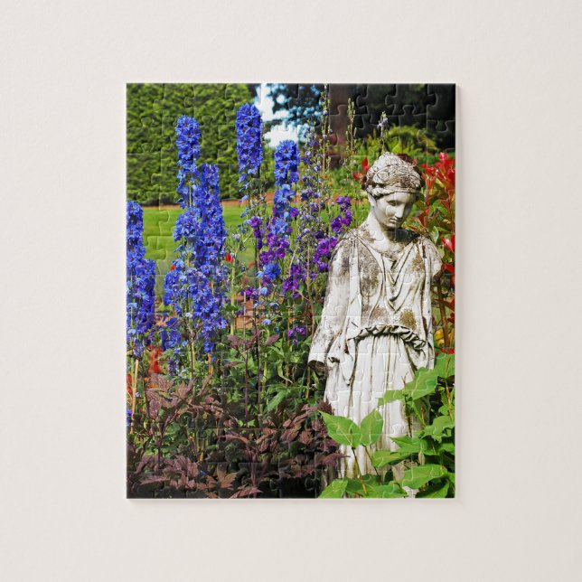 Blue delphinium flower garden and goddess statue jigsaw puzzle (Vertical)