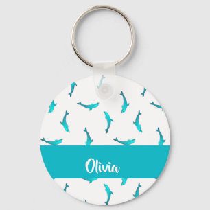 Blue dolphins on white key ring