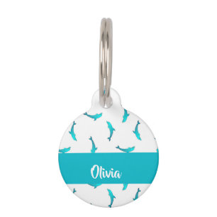 Blue dolphins on white pet tag