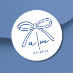 Blue Drawn Bow Whimsical Wedding Monogram Classic Round Sticker<br><div class="desc">Blue Hand Drawn Bow Whimsical Wedding Monogram Classic Round Sticker. Minimalist European Inspired Round Wedding Stickers. These simple and elegant round wedding stickers are the perfect touch for sealing envelopes, decorating favours, or adding a personalised element to your wedding details. Inspired by timeless French, Italian, and European aesthetics, the design...</div>