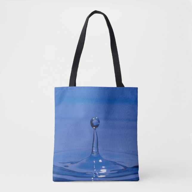Blue drop of water in motion on a tote bag (Front)