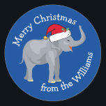 Blue Elephant Funny Custom Christmas Gift Classic Round Sticker<br><div class="desc">Cute holiday animals are my favourite part of Christmas. A beautiful elephant wearing a red Santa hat and looking happy. This personalised blue elephant gift sticker fills me with the Christmas spirit.</div>