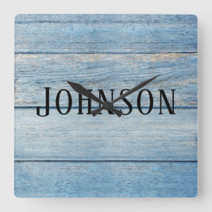 blue faded wood with family name square wall clock