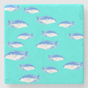 Blue fish on turquoise stone coaster