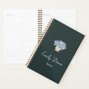 Blue flowers in vase grey planner