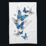 Blue Flying Butterflies Morpho Tea Towel<br><div class="desc">Flying Blue Butterflies morpho and white butterflies on a light abstract background. Morpho. Design with blue butterflies morpho.</div>