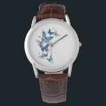 Blue Flying Butterflies Morpho Watch<br><div class="desc">Flying Blue Butterflies morpho and white butterflies on a light abstract background. Morpho. Design with blue butterflies morpho.</div>