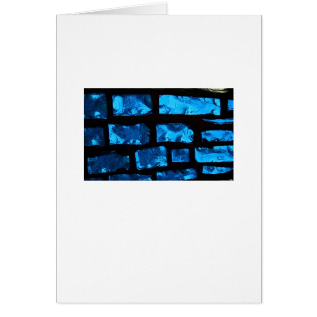 Blue glass chunks with black grout between them (Front)