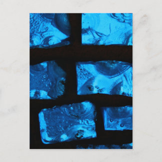 Blue glass chunks with black grout between them postcard
