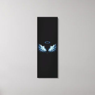 Blue Glowing Angel Wings on black background Canvas Print