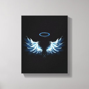Blue Glowing Angel Wings on black background Canvas Print