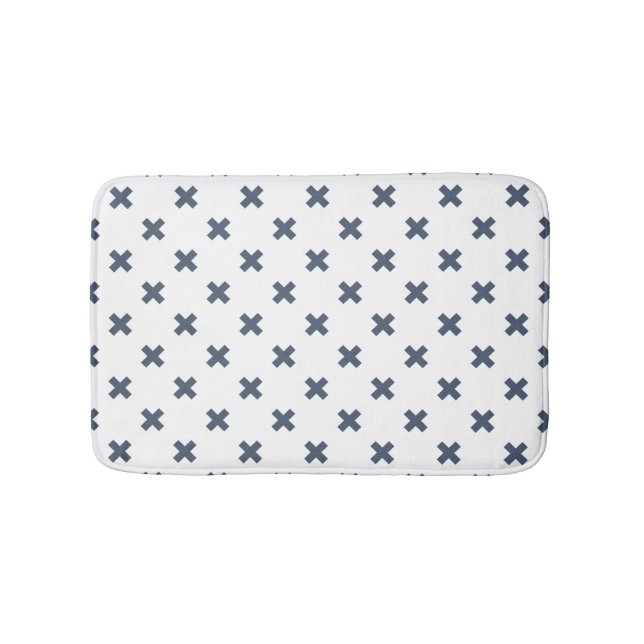 Blue-gray cross stitches on white bath mat (Front)