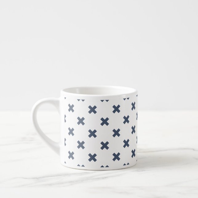 Blue-gray cross stitches on white espresso cup (Left)