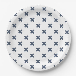 Blue-gray cross stitches on white paper plate
