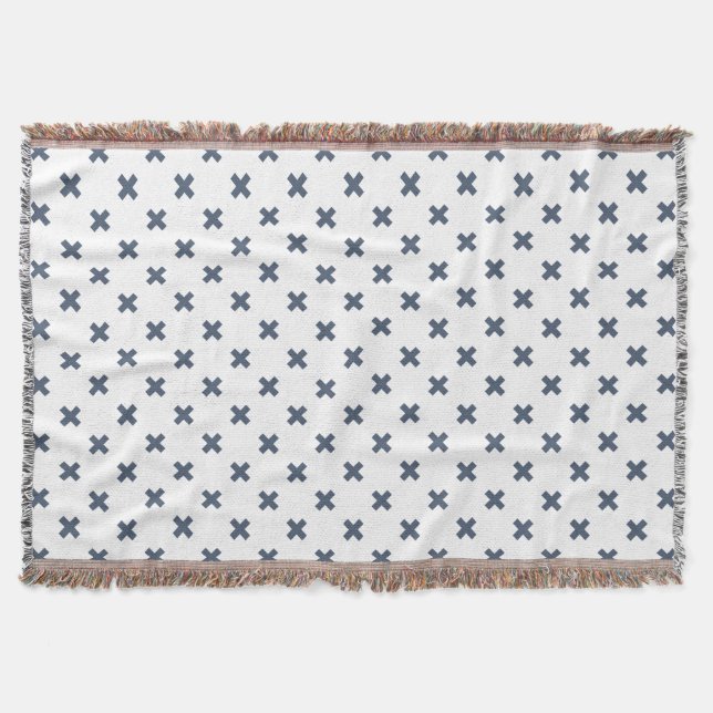 Blue-gray cross stitches on white throw blanket (Front)