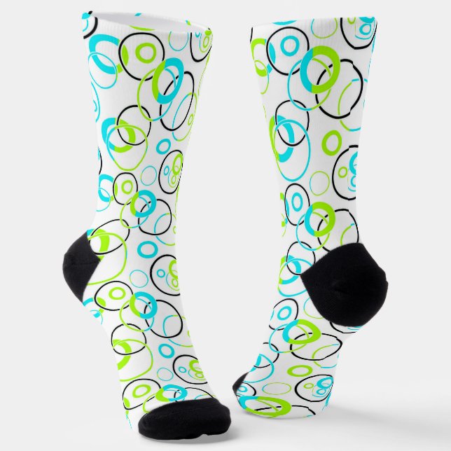 blue green and black rings and circles on white  socks (Angled)