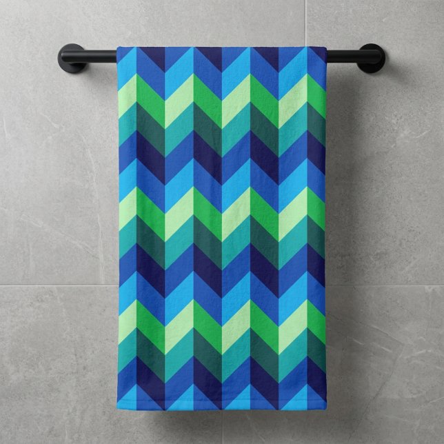 Blue Green Ombre Chevrons Bath Towel (Blue Green Ombre Chevrons Bath Towel hanging on a towel rod against a wall in modern style bathroom.)