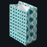 Blue Green Star of David Pattern Medium Gift Bag<br><div class="desc">This festive gift bag is designed for Jewish holidays and celebrations, featuring a Star of David pattern in vibrant blue and green tones. The stars are arranged on a crisp white background, adding a fresh, colourful touch perfect for Hanukkah, Bar or Bat Mitzvahs, and other special occasions. This gift bag...</div>