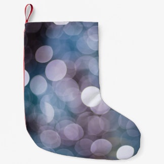 Blue grey bokeh, abstract background. small christmas stocking