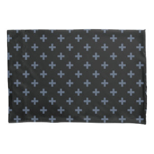 Blue-grey polka crosses on black pillowcase