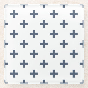 Blue-grey polka crosses on white glass coaster