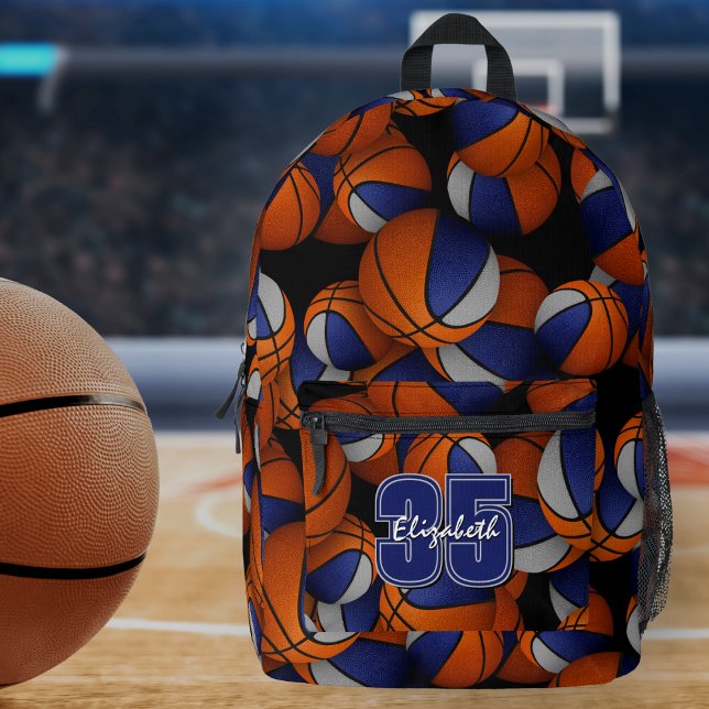 Blue grey team sports basketballs pattern printed backpack (On gymnasium floor: Basketball player's backpack w blue/gray team colors, athlete jersey number)