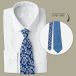 Blue Hawaiian Plumeria Flowers Personalised Tie<br><div class="desc">The 'Blue Hawaiian Plumeria Flowers Personalised neck tie' necktie is inspired by the enchanting beauty of Hawaii and its vibrant floral landscape, making it the perfect accessory for couples seeking to infuse their wedding with tropical charm. Designed with elements of navy blue tie adorned with delicate Plumeria flowers, this tie...</div>