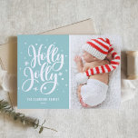 Blue Holly Jolly Hand Lettering Baby Photo Holiday Card<br><div class="desc">Festive Holly Jolly Hand-Lettered Photo Holiday Card | Send festive holiday greetings to family and friends with this customisable holiday flat card. It features a hand-lettered "holly jolly" overlay with snow and snowflakes accent. Customise by adding your favourite photo. Matching items are available.</div>