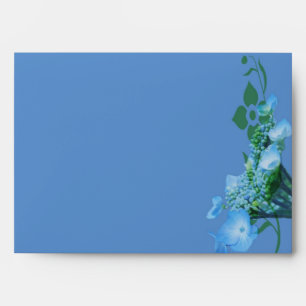 blue hydrangea flowers in blue background envelopes