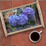 Blue Hydrangea Garden Picture Text Template Serving Tray<br><div class="desc">Pretty floral wood serving tray with hydrangea flowers and a place for your text. Purple blue hydrangea blooms are the central image in the photograph of a tropical garden. Other colourful plants and leaves in the background make this an interesting bottom image for either brown or black wood trays. A...</div>