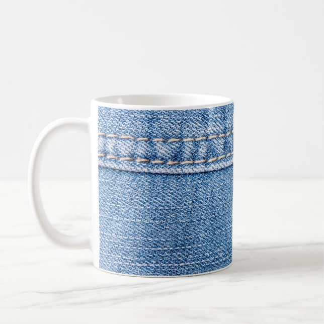 Blue jeans sew closeup texture.  coffee mug (Left)