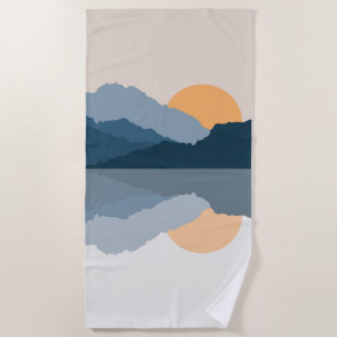 Blue mountains reflected in the lake beach towel