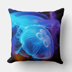 Blue ocean glowing jellyfish throw pillow