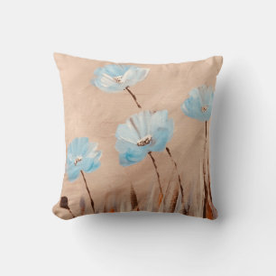 Blue poppies in grass cushion