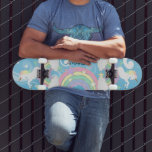 Blue Rainbow Unicorn Skateboard<br><div class="desc">Unicorn Skateboard featured with a blue background and colourful rainbows and flying unicorns ready for you to personalise. ✔NOTE: ONLY CHANGE THE TEMPLATE AREAS NEEDED! 😀 If needed, you can remove the text and start fresh adding whatever text and font you like. 📌If you need further customisation, please click the...</div>